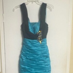 Dave & Johnny long formal dress in Aqua and Black with gemstones accents.